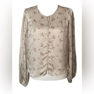 LoveShackFancy cream and floral blouse